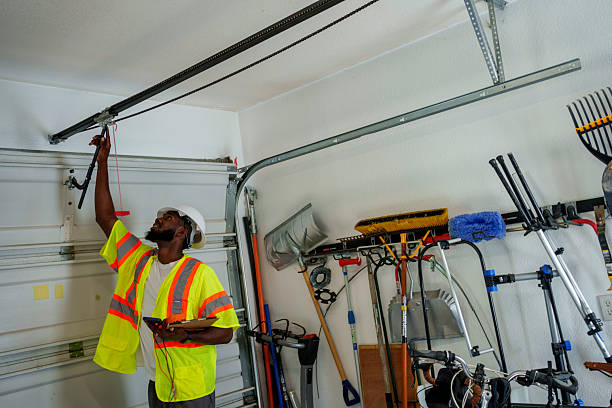 Professional Garage Door Panel Replacement technician working in West Chatham, MA